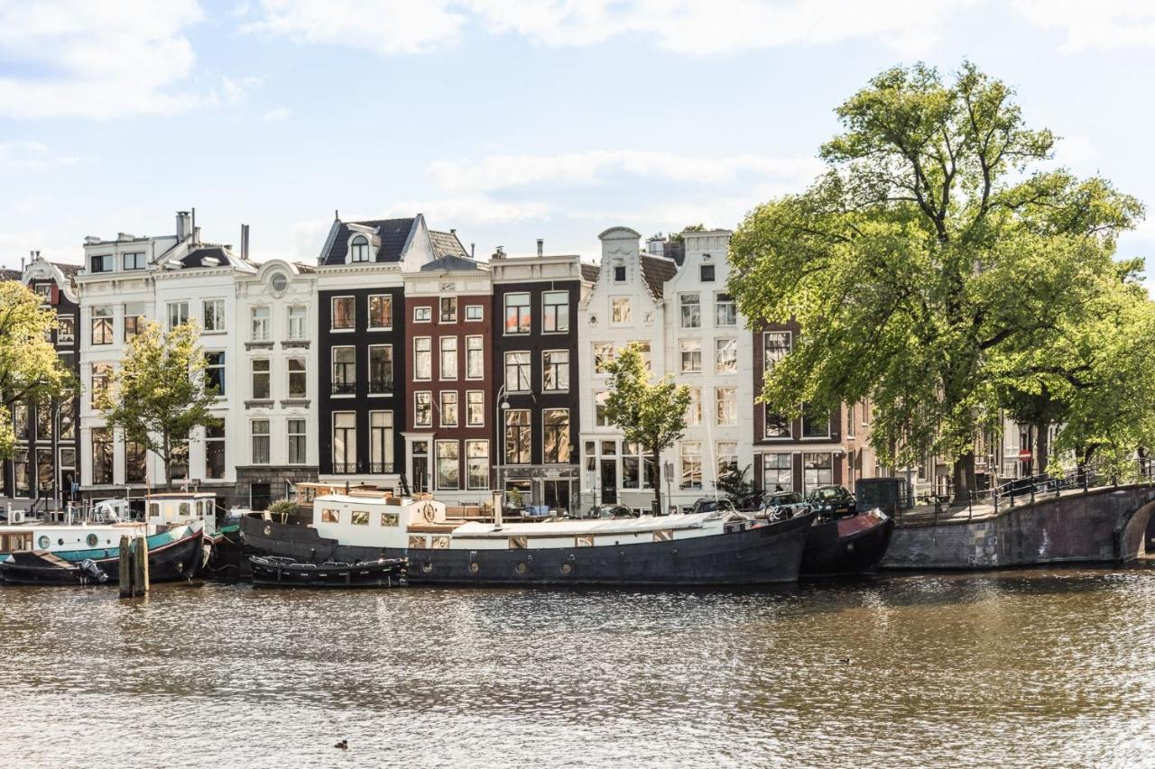Next To Skinny Bridge Near Rembrandtsquare * Amsterdam